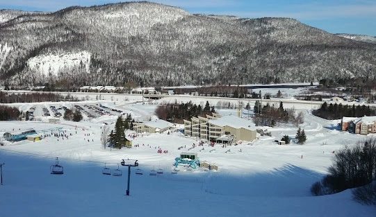 Ski runs cut through the forest at Marble Mountain resort.